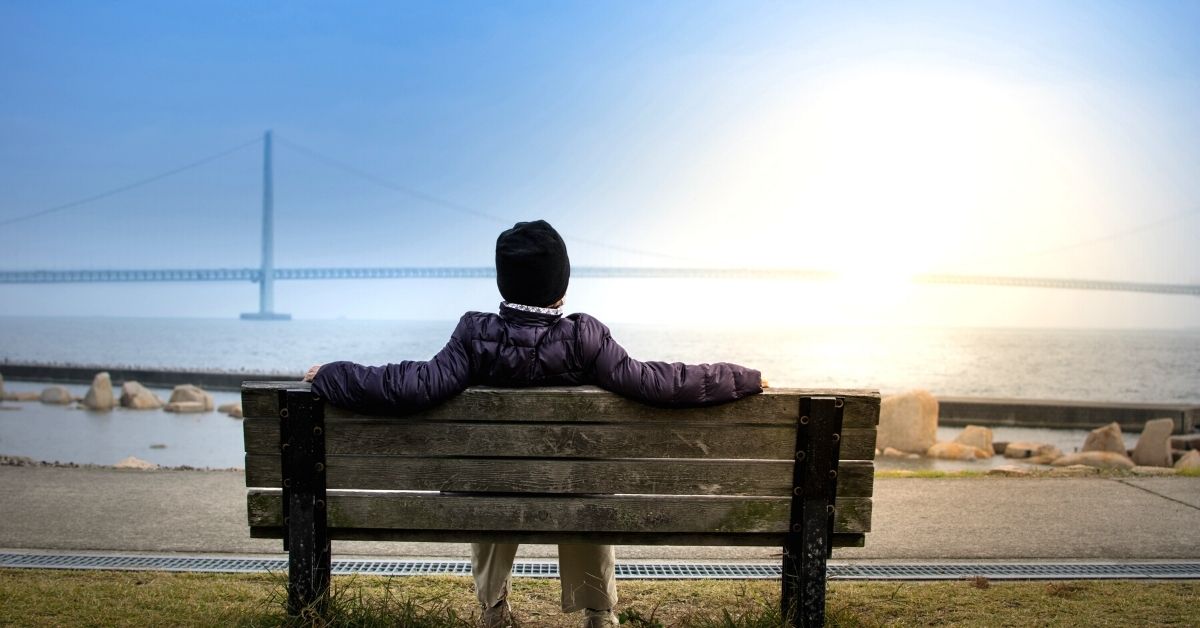 Man sitting on Park Bench